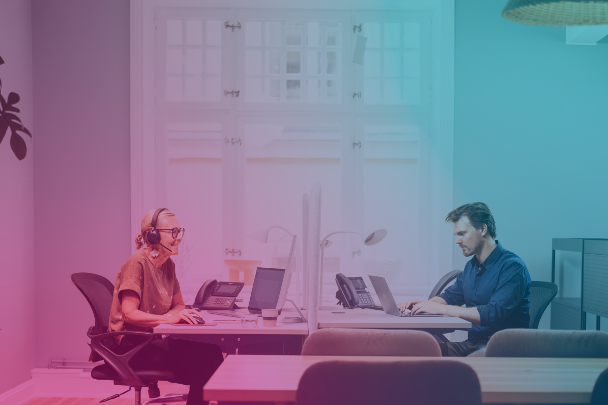 Office-woman-man-caucasian-laptop-headset-deskphone-window-dstnjpg - filter_LR