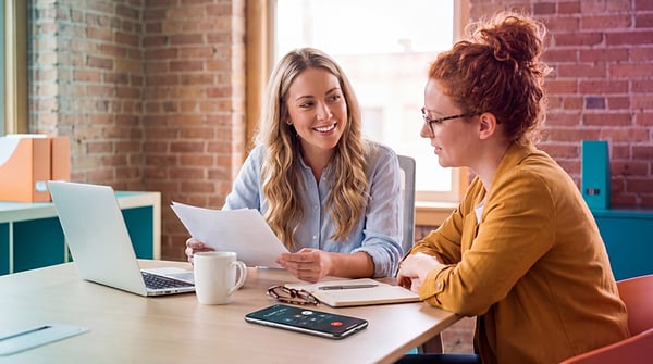 meeting-two-women-office-incoming-calljpg