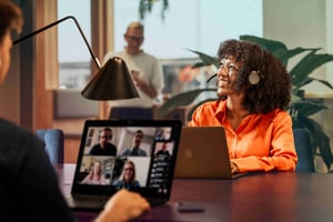 office-woman-black-man-woman-caucasian-headset-laptop-looking-up-dstny_LR