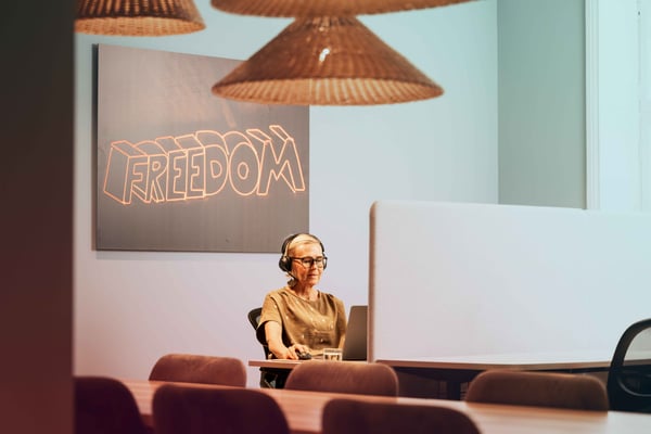 office-woman-caucasian-headset-laptop-freedom-art-dstny_LR-1