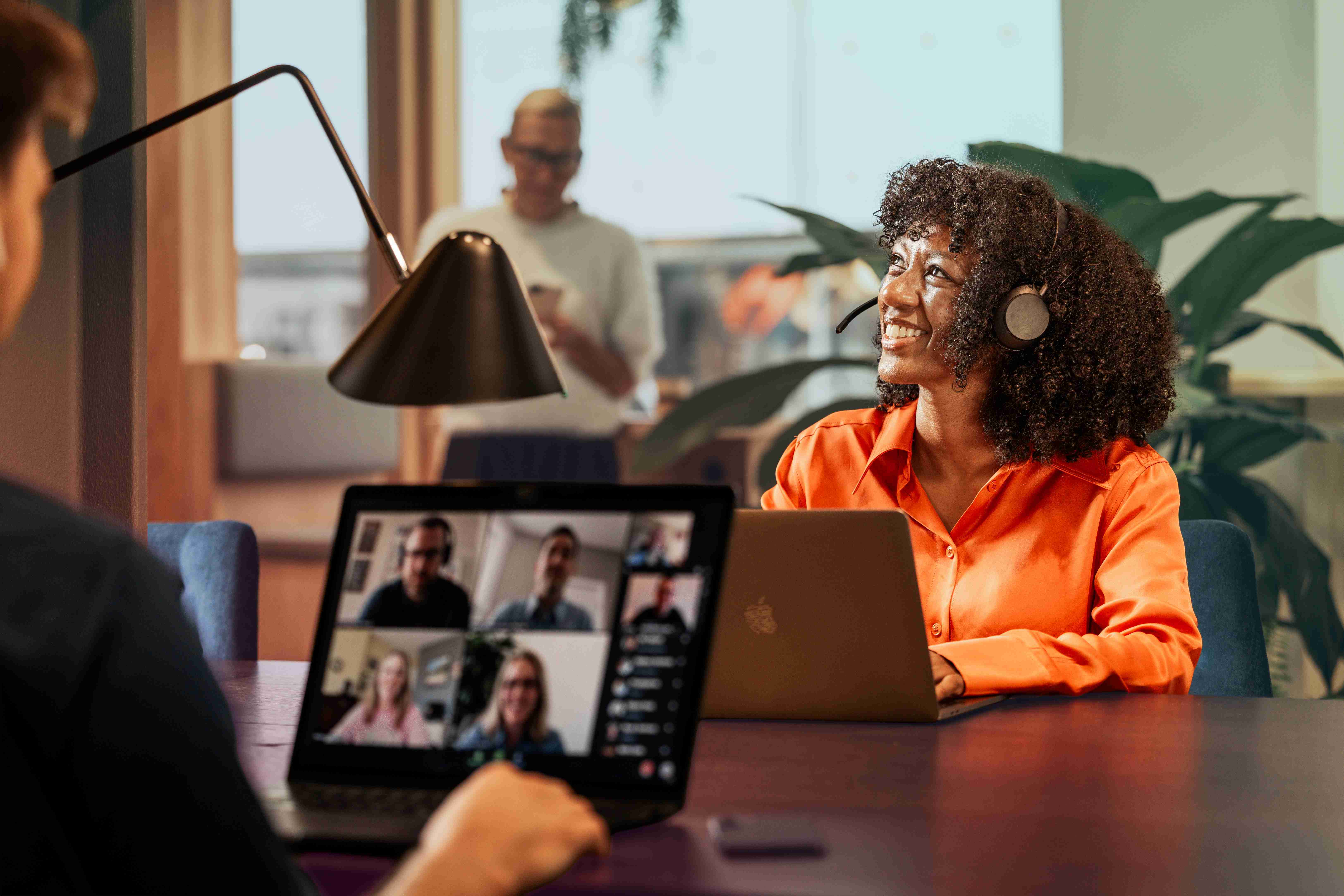 office-woman-black-man-woman-caucasian-headset-laptop-looking-up-dstny_LR