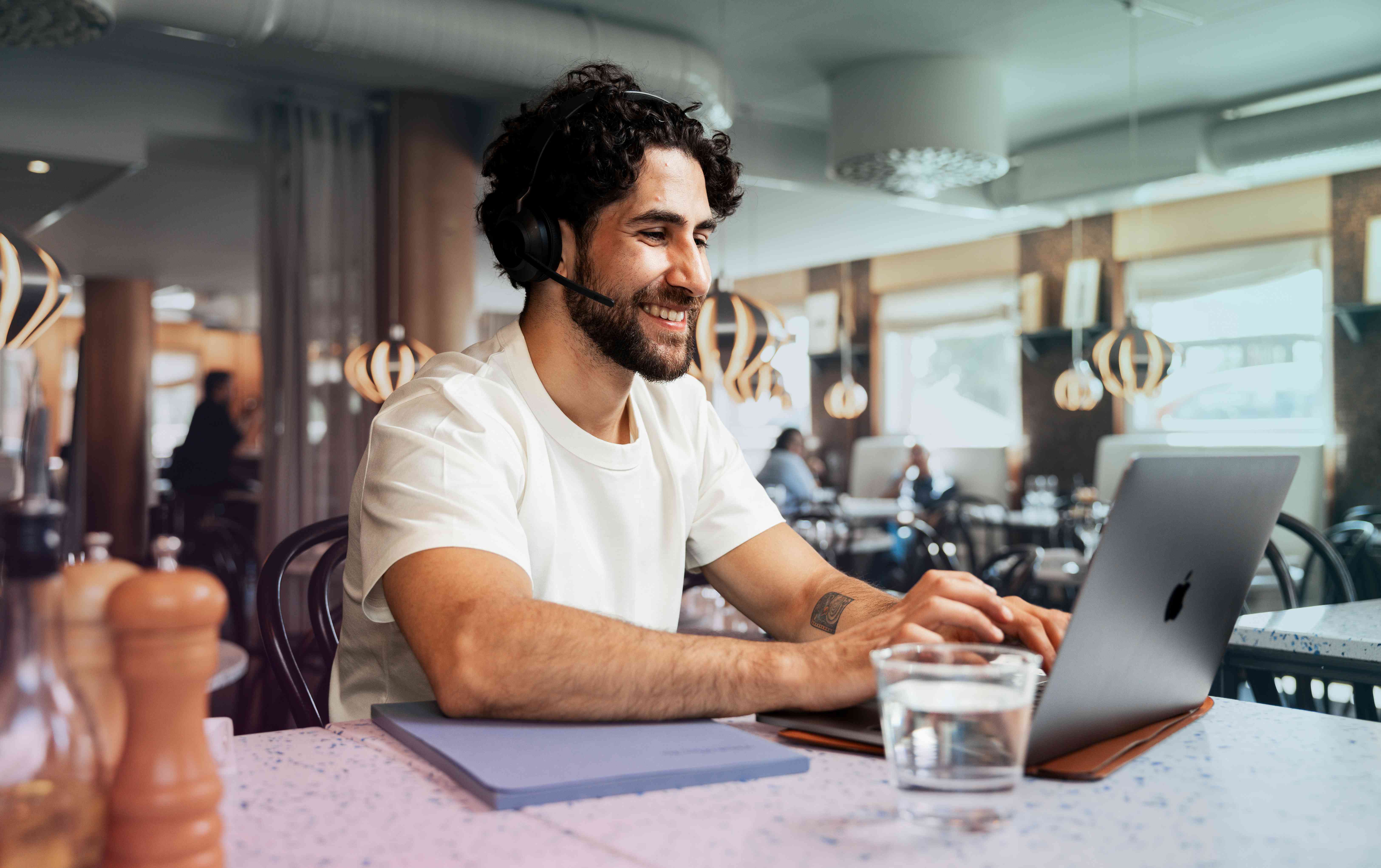 restaurant-man-latino-laptop-headset-typing-smiling-water-dstny_LR