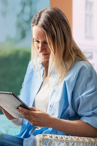 50-50-home-office-woman-tablet-blue-shirt-coffee-cup-dstny (1).jpg